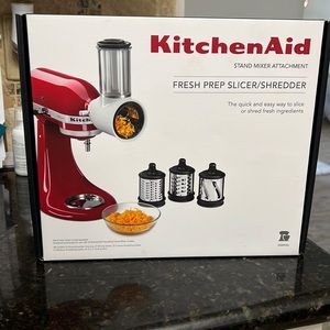Never opened kitchen aid slicer and shredder